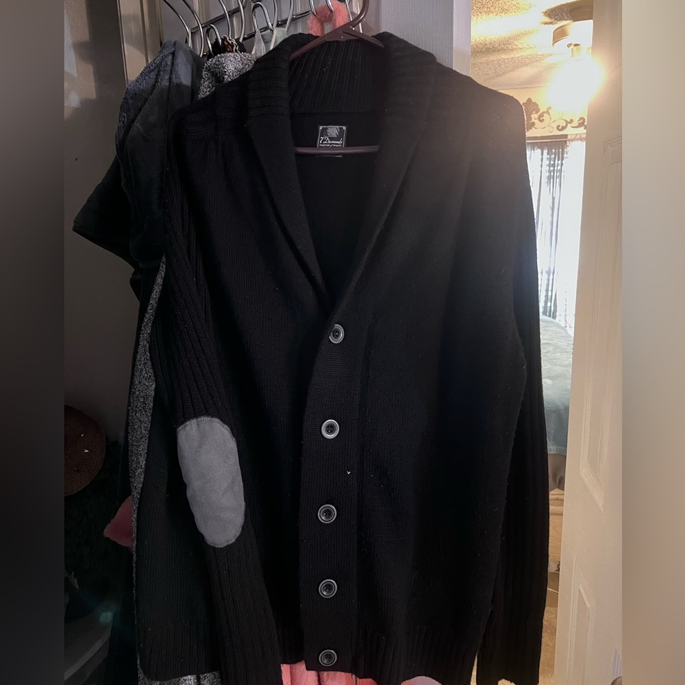Gently worn sweater!  Has been dry cleaned